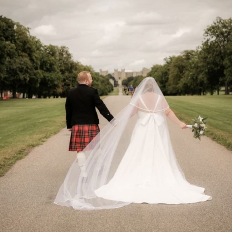 Couple walking down Long Walk
