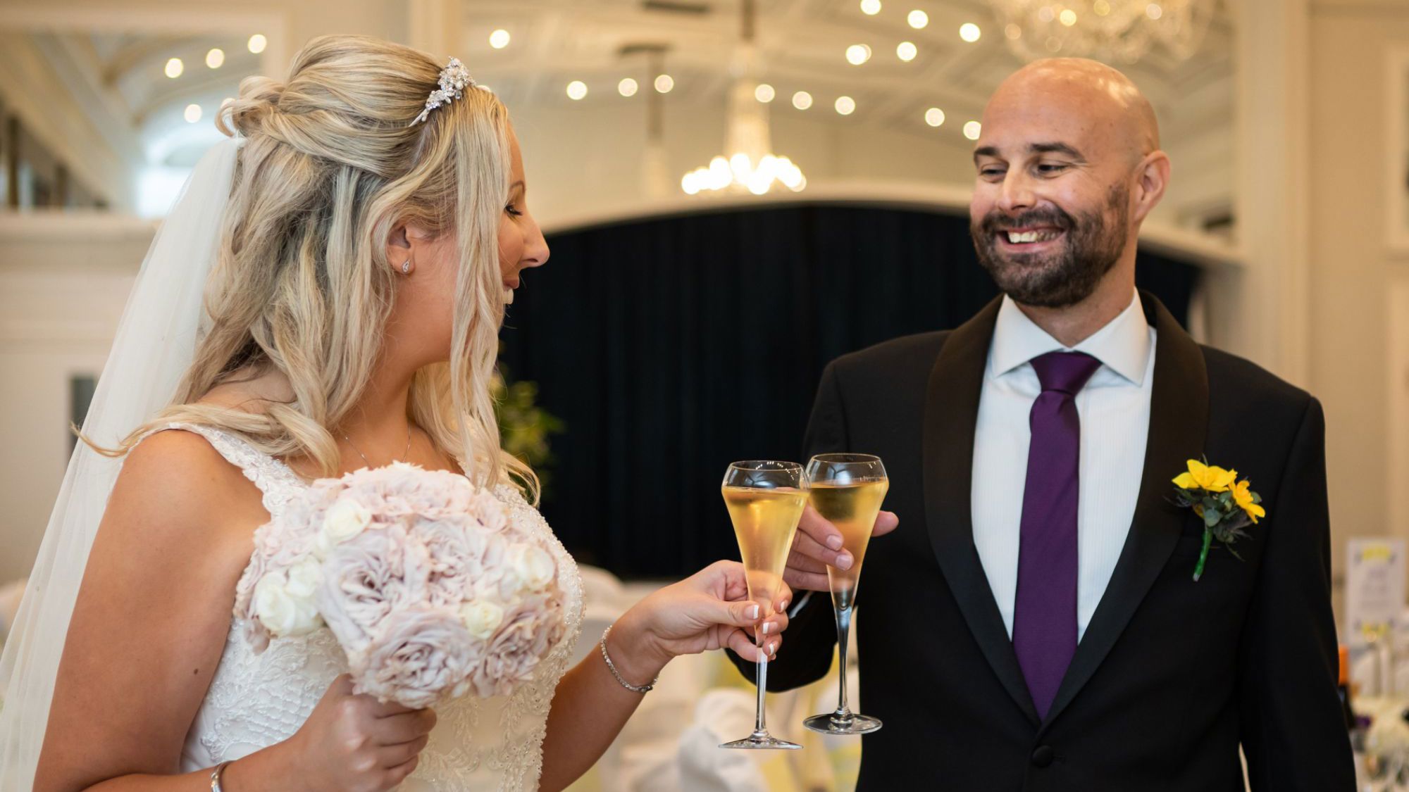 Wedding couple with sparkling wine