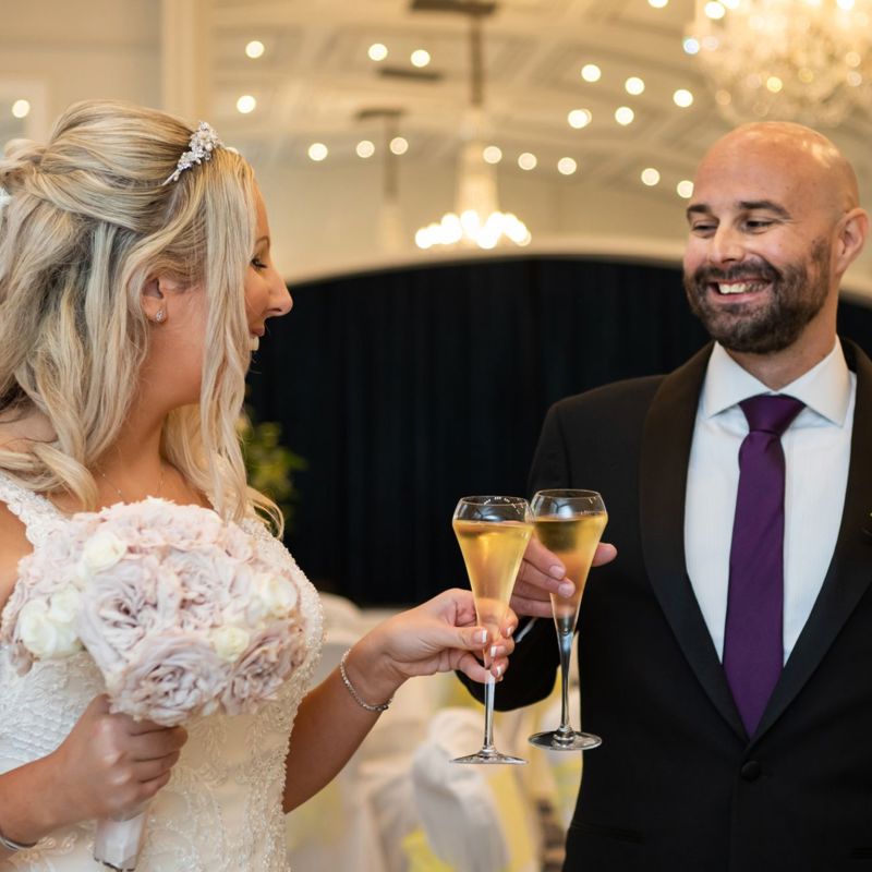 Wedding couple with sparkling wine