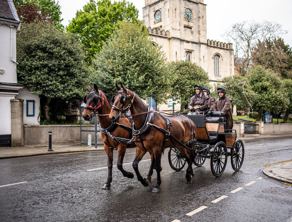 Horse carriages outside The Castle Hotel