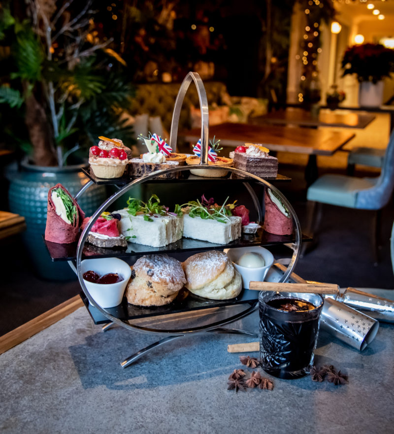 Afternoon tea selection including scones and cakes