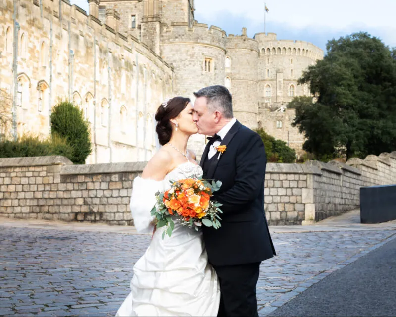 Bride and groom outside Windsor Castle – Abi Moore Photography