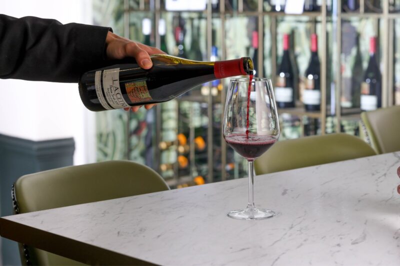 The Castle Hotel Windsor waiter pouring red wine