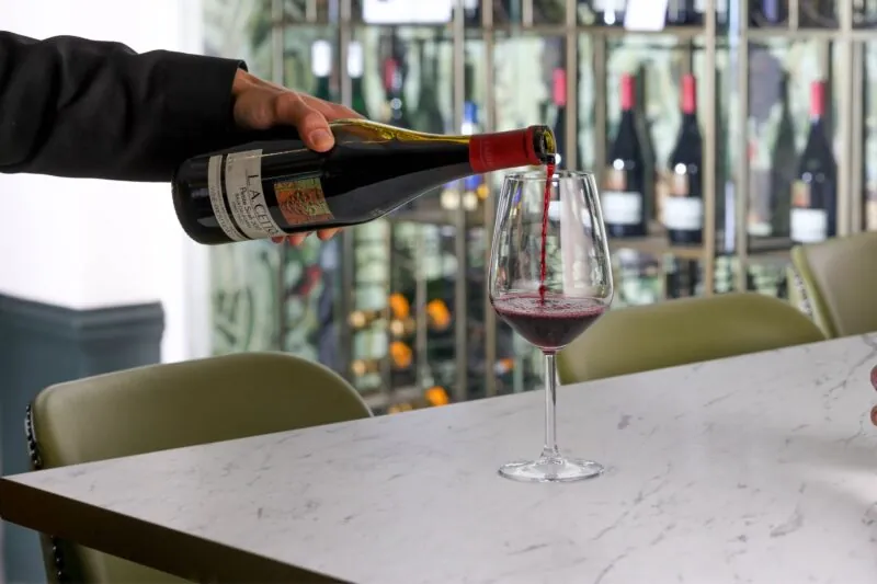 The Castle Hotel Windsor waiter pouring red wine