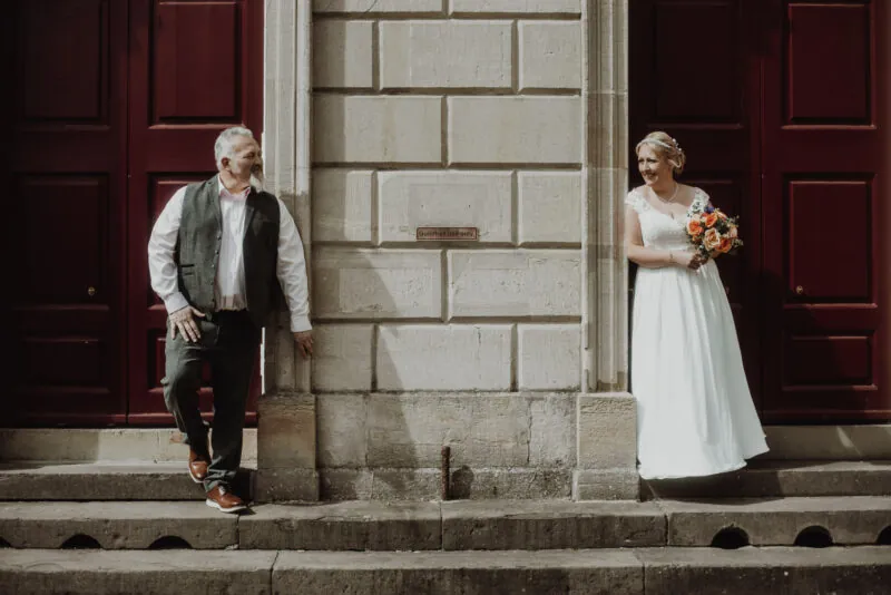 Karen Robins bride and groom outside Guildhall The Castle Hotel