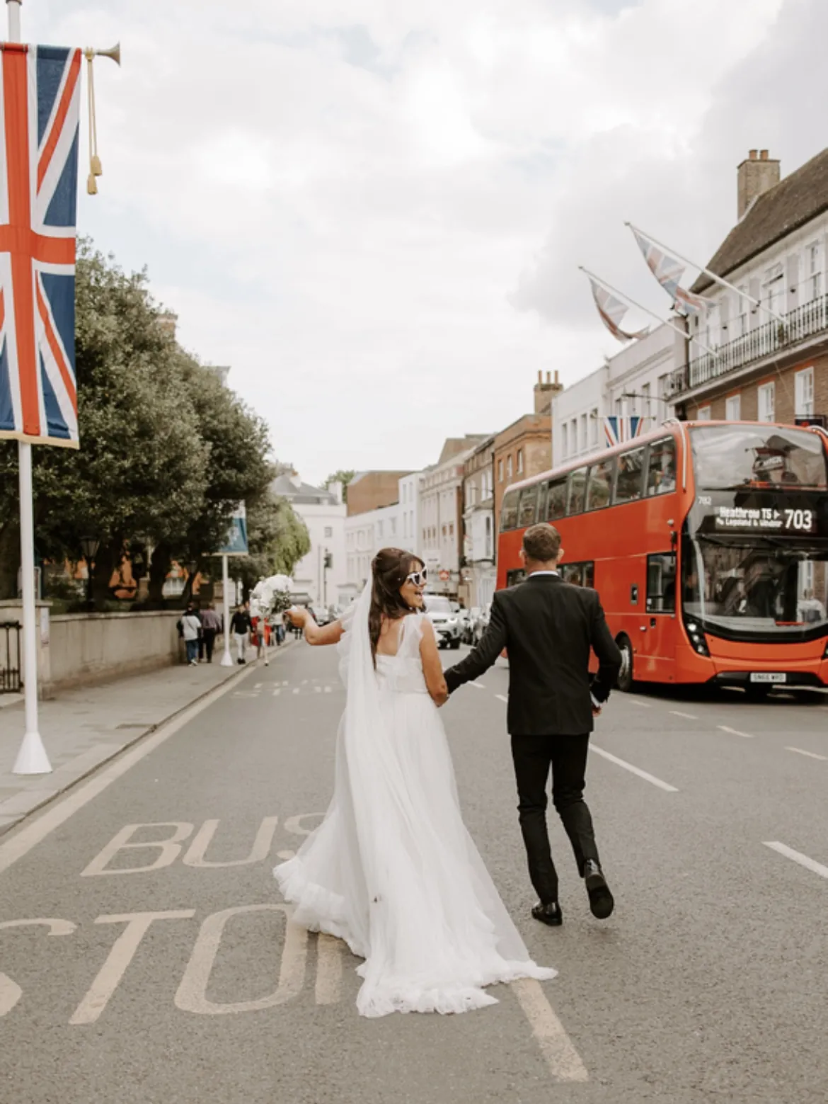 Lucy Riddle walking down Windsor high street The Castle Hotel Windsor
