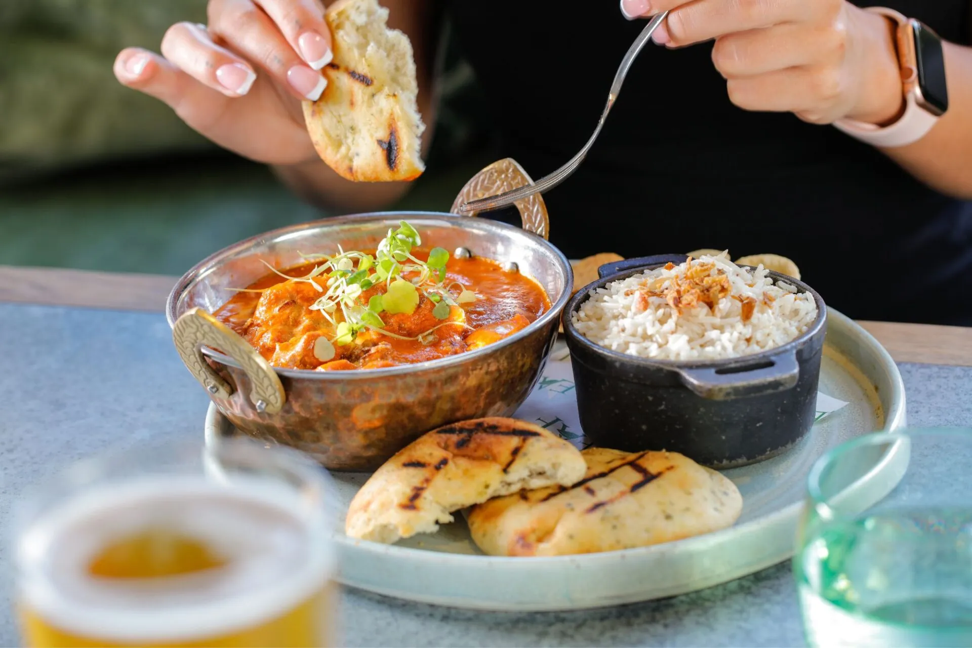 The Castle Hotel Windsor eating Chef Suraj's special butter chicken