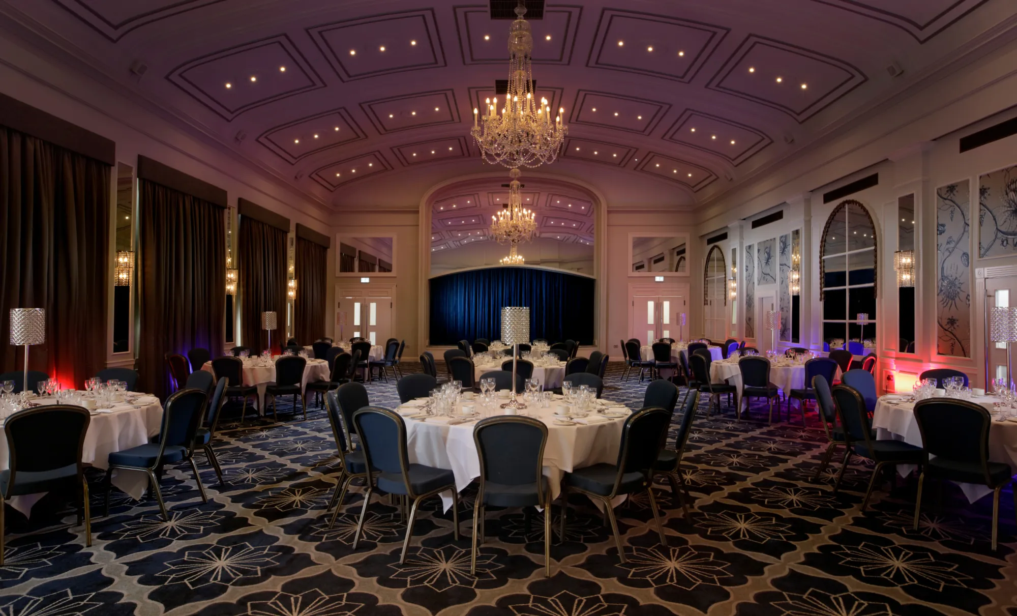 The Castle Hotel Windsor suite dinner dance with blue and red uplighters