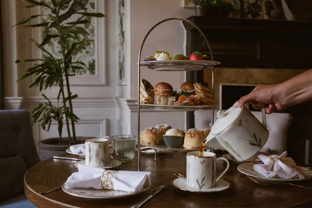 The Castle Hotel Windsor afternoon tea pouring tea